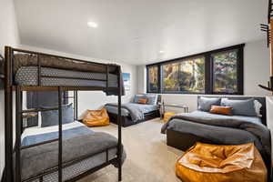 Bedroom with carpet flooring and recessed lighting