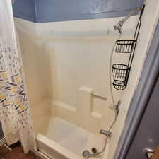 Bathroom featuring shower / bath combo