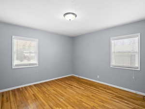 Unfurnished room with light wood finished floors