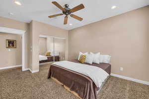 Bedroom featuring ceiling fan, carpet flooring, a closet, and recessed lighting