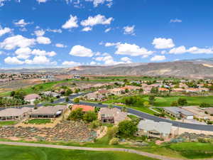 Aerial view of residential area with a mountain backdrop