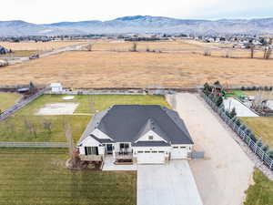 Aerial view of sparsely populated area with a mountain backdrop