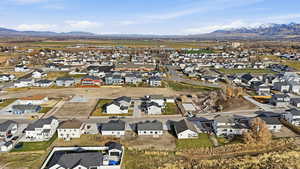 View of property location featuring nearby suburban area and a mountainous background