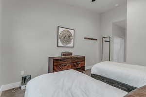 Bedroom featuring carpet floors and a ceiling fan