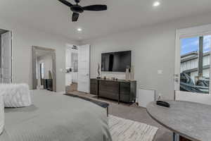 Bedroom featuring a ceiling fan, recessed lighting, and carpet flooring