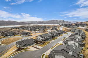 Aerial view of residential area with a mountainous background