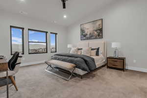 Bedroom featuring an office area, light carpet, recessed lighting, and ceiling fan