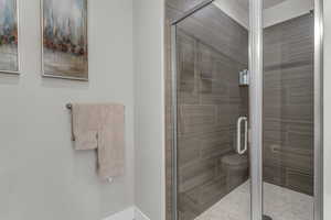 Full bath featuring a stall shower