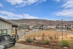 View of yard with a mountain view and a residential view