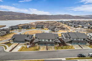 Aerial view of residential area with a mountain backdrop