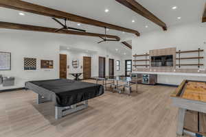 Recreation room featuring billiards, wood finish floors, recessed lighting, ceiling fan, and beverage cooler