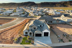 Aerial view of residential area with a mountainous background