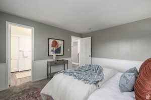 Carpeted bedroom with baseboards