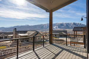 Wooden deck featuring a mountain view
