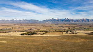 View of mountain backdrop featuring rural landscape