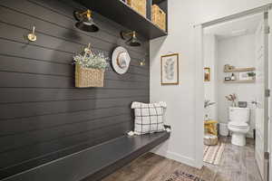 Mudroom with wood finished floors