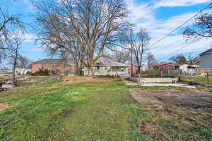 View of yard with a residential view and a patio area