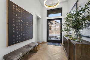 Foyer with a high ceiling