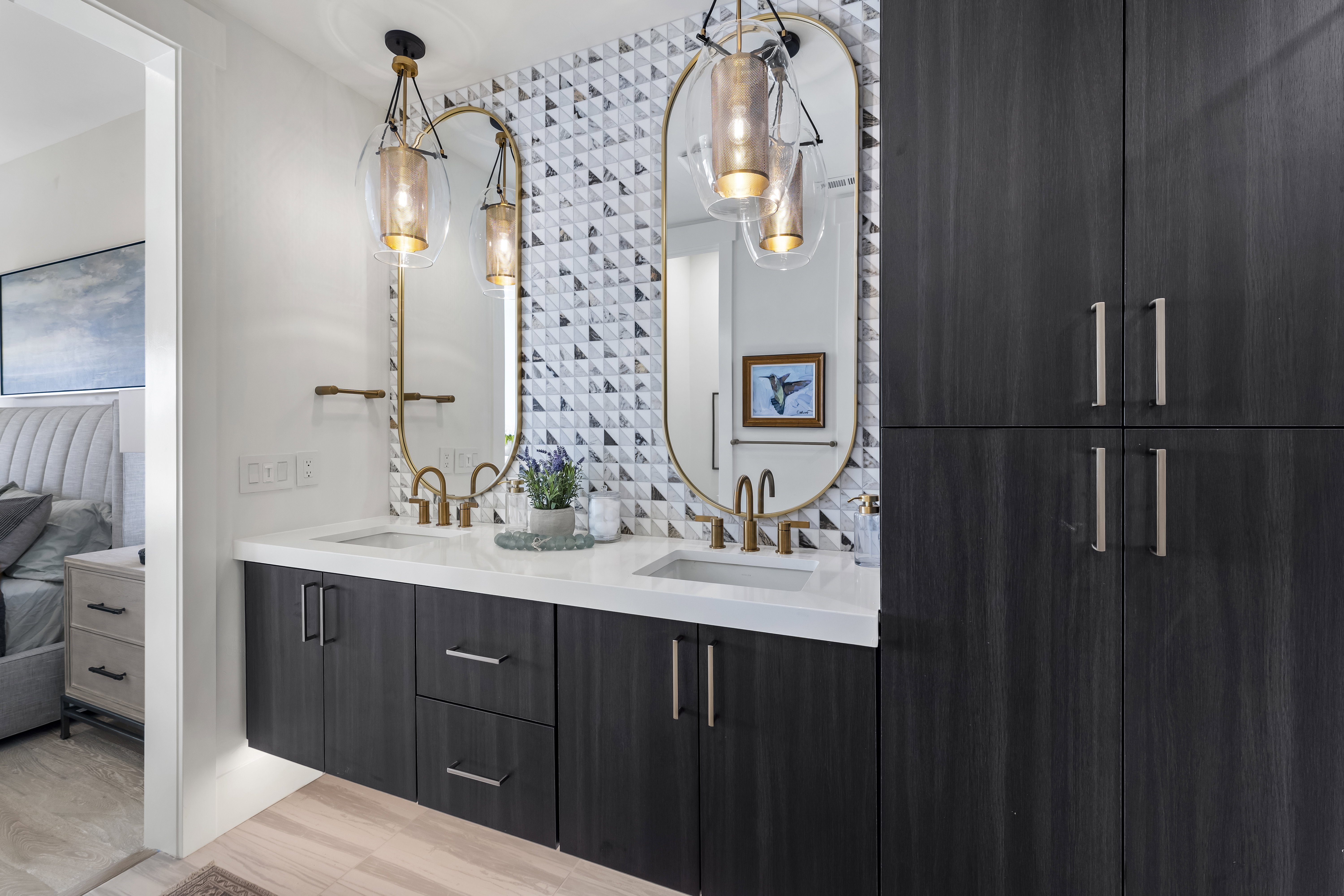 Ensuite bathroom featuring double vanity