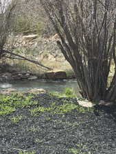 View of yard featuring a water view