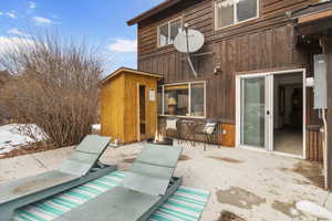 View of patio / terrace with a fire pit