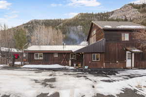 View of front of house featuring a mountain view