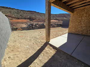 View of yard with a patio area and a mountain view