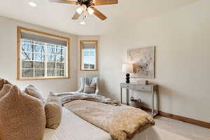Bedroom with a ceiling fan, carpet flooring, and recessed lighting