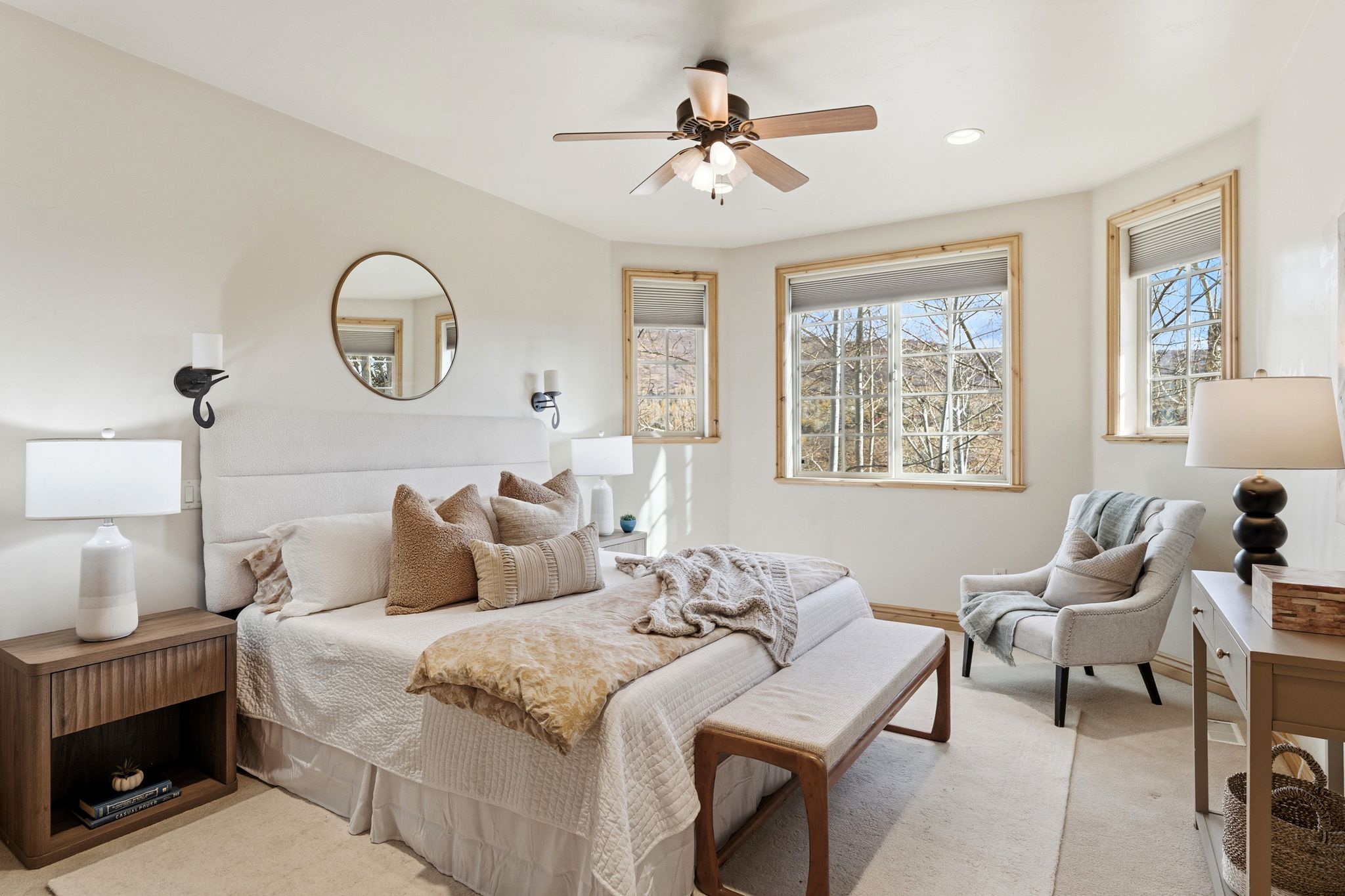 Bedroom with a ceiling fan and recessed lighting