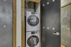 Laundry area with stacked washer / dryer