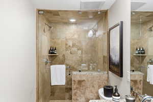 Bathroom with a tile shower