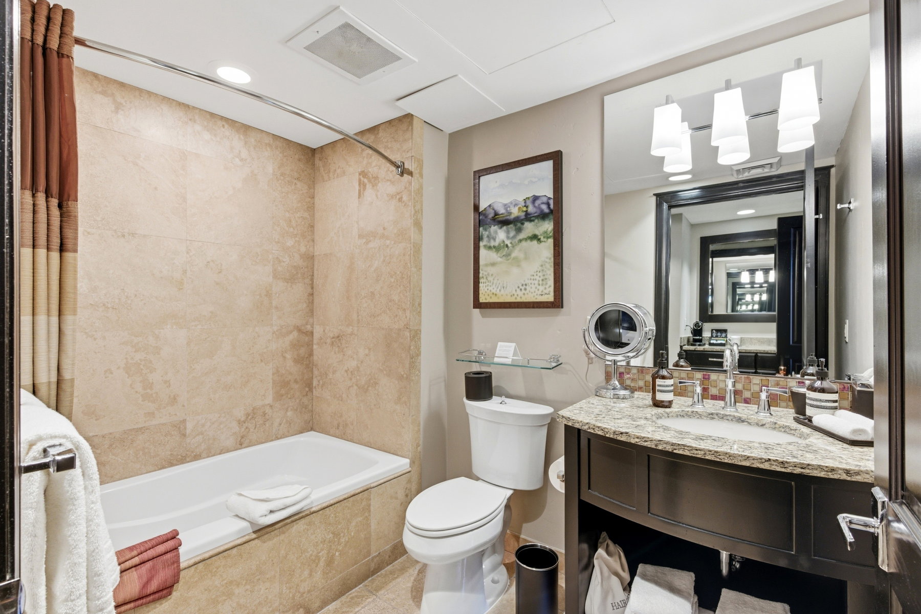 Full bathroom with recessed lighting, tiled shower / bath, vanity, and tile patterned flooring