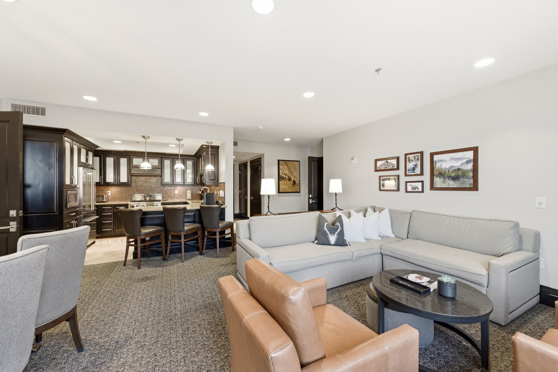 Living room featuring recessed lighting and light carpet