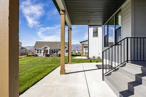 View of patio with a mountain view