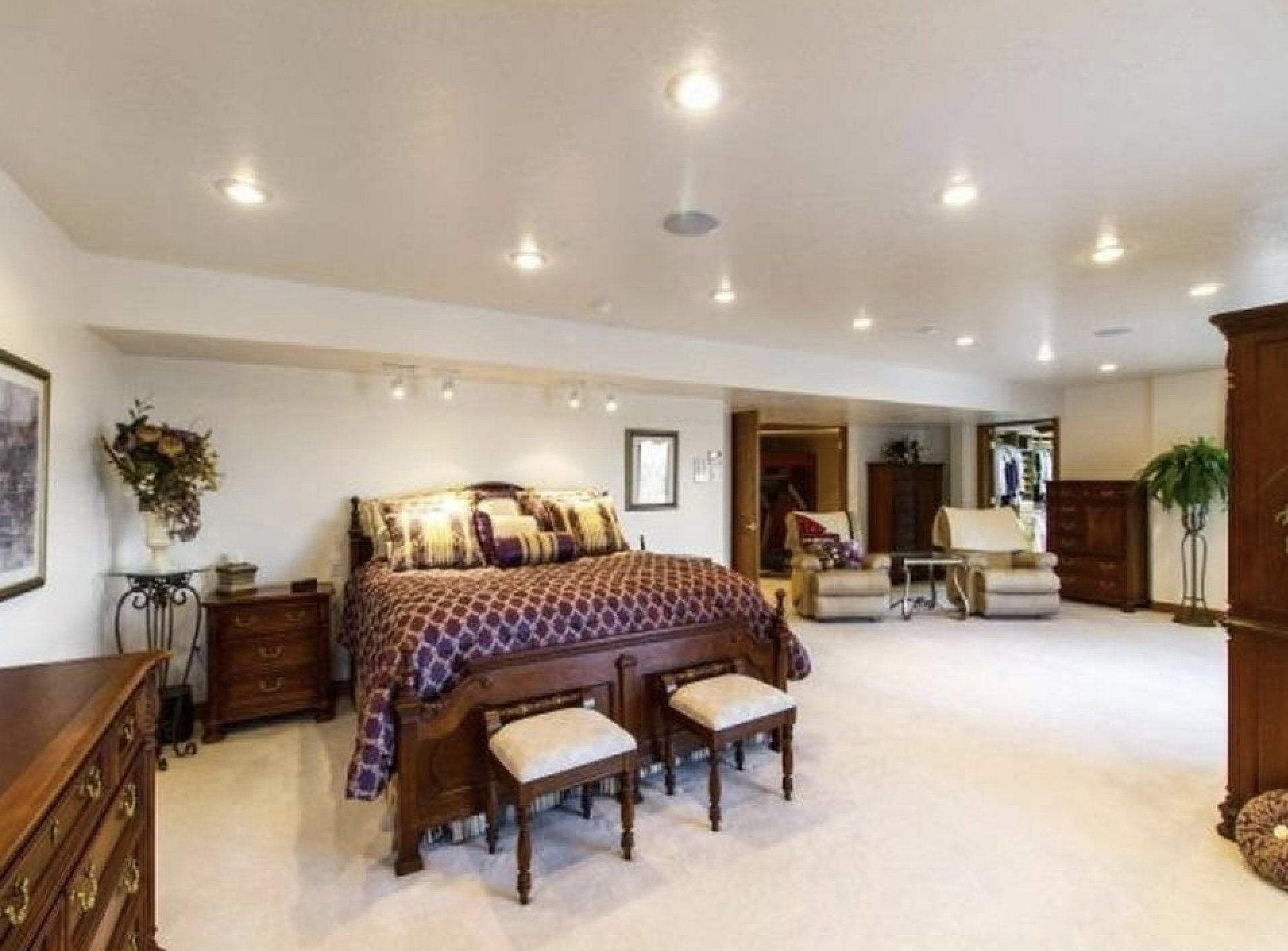 Bedroom with light colored carpet