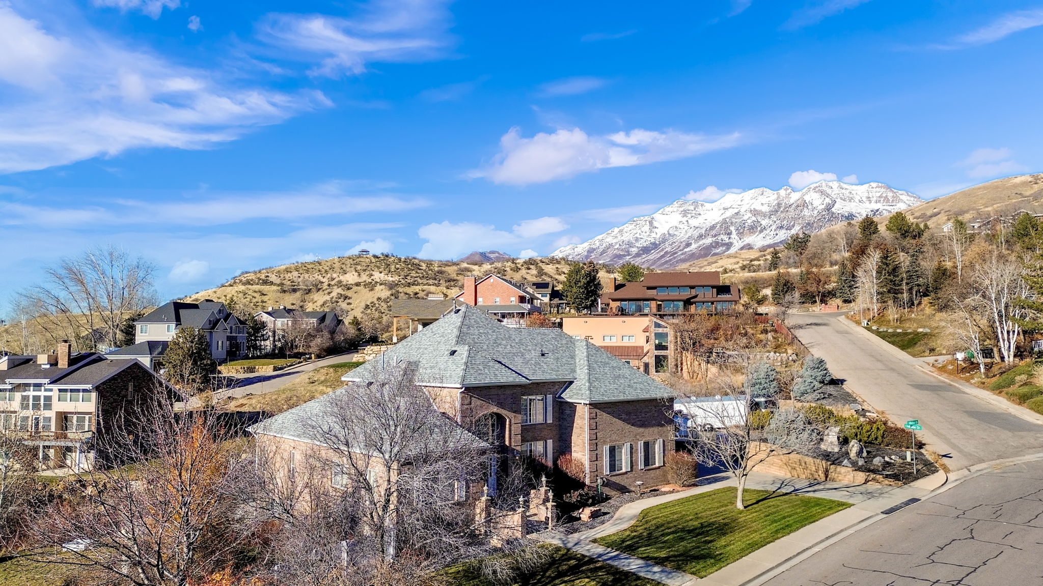 Aerial view of residential area with mountains