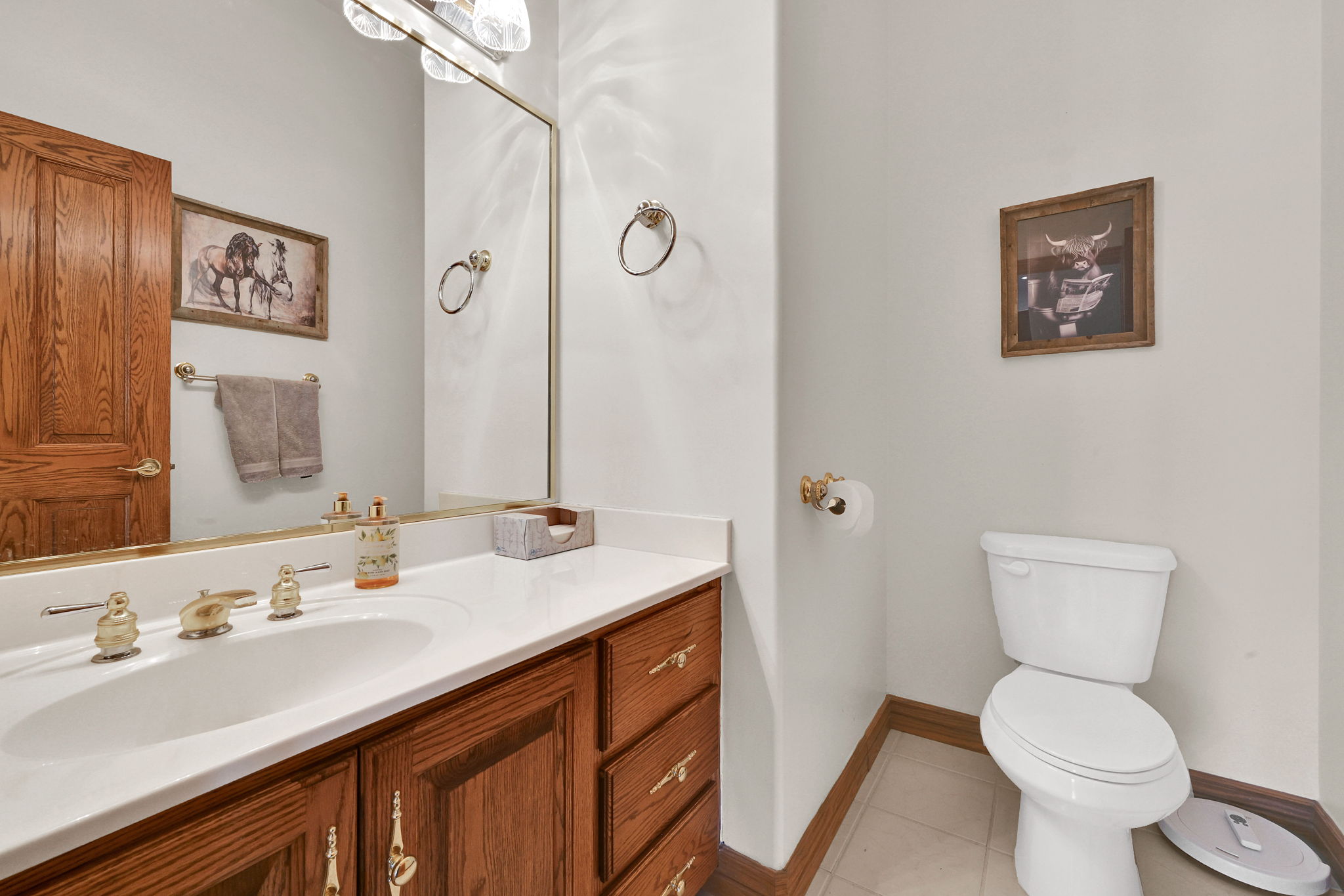 Bathroom featuring vanity and light tile patterned floors
