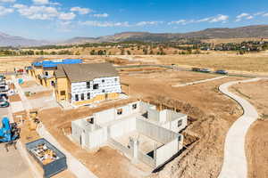Overview of rural landscape with a mountain backdrop