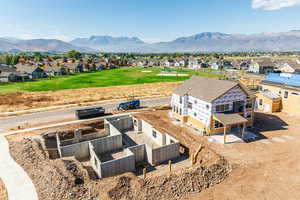 Aerial view of residential area with a mountainous background