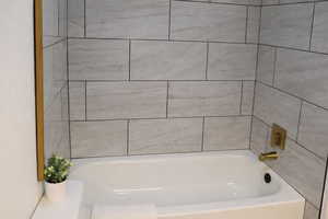 Bathroom with a tub to relax in