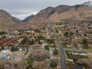 View of mountain backdrop with nearby suburban area