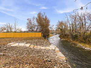 View of yard featuring a water view