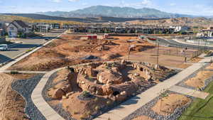 Aerial perspective of suburban area with a mountain backdrop