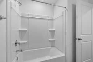 Bathroom with shower / bath combination