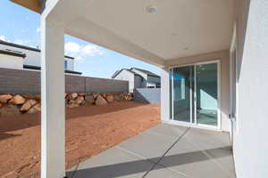 Fenced backyard featuring a patio area
