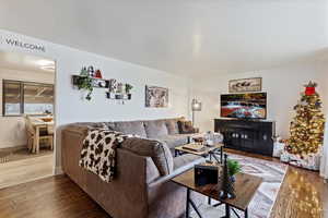 Living area featuring hardwood / wood-style flooring