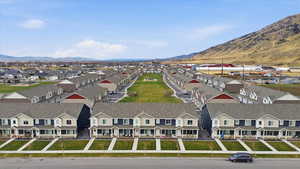 Aerial view of residential area with mountains