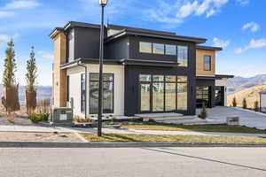 Rear view of property featuring a mountain view
