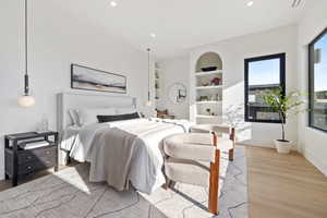 Bedroom featuring light wood-style floors and recessed lighting