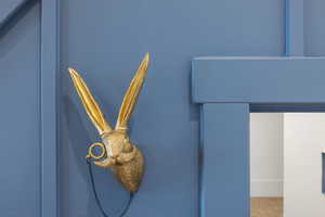 Kid play room at the bottom of the stairs